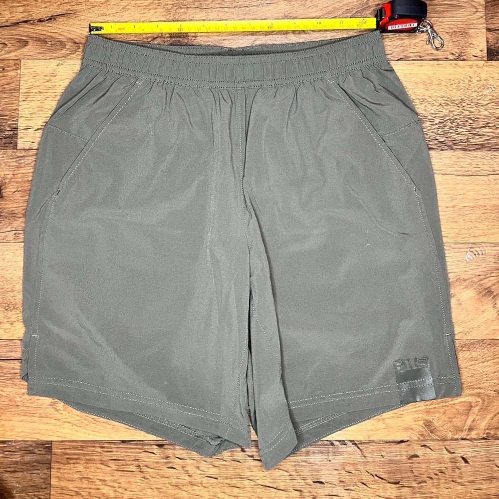 5.11 tactical shorts. Olive green and black waist is 13.25”